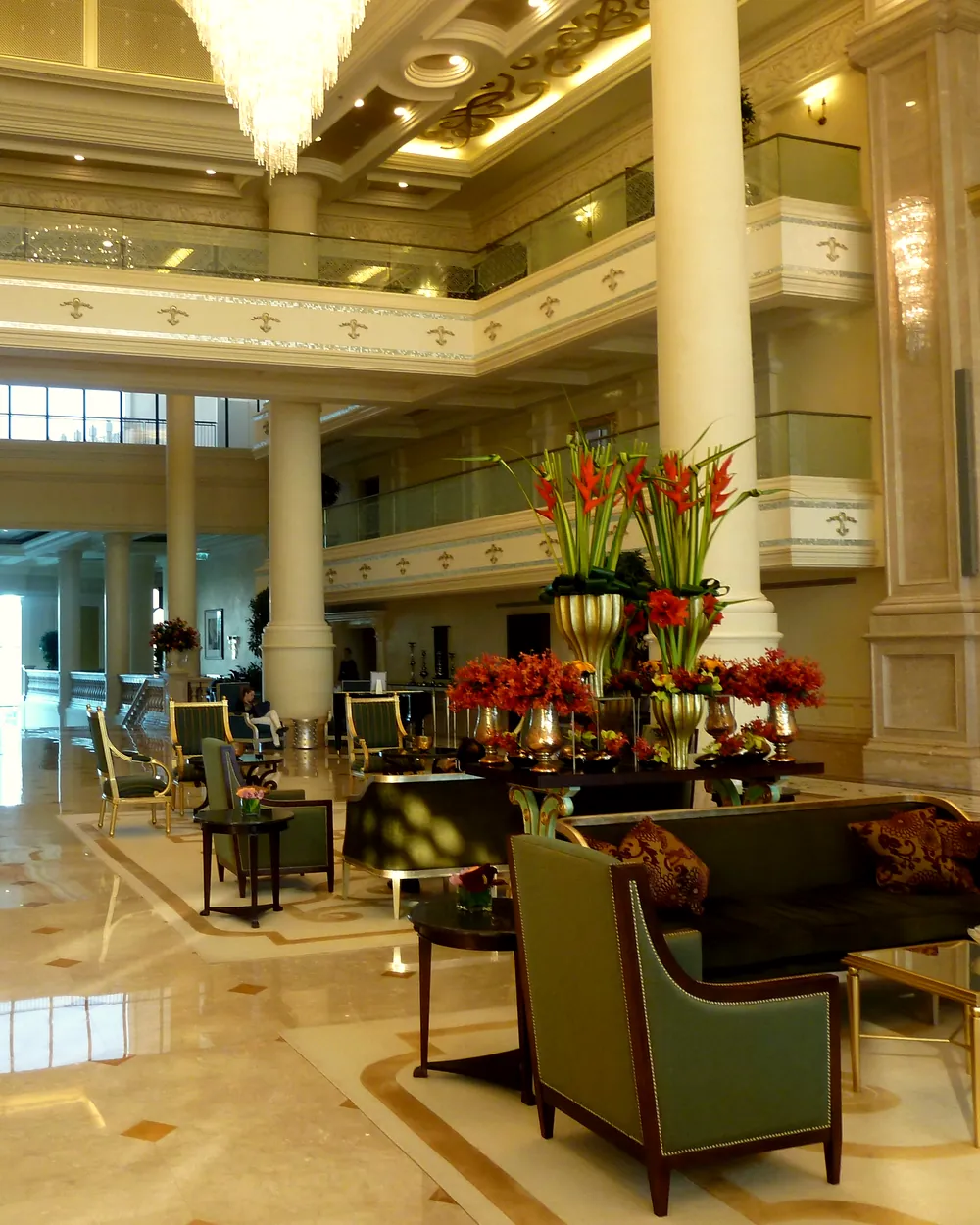 Armchairs and flowers in the lobby lounge of the Ritz-Carlton Abu Dhabi